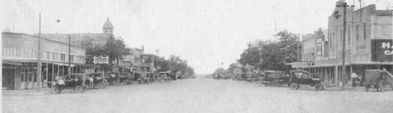 Cars parked along Main Street in downtown Fredericksburg, Texas, in the 1920s