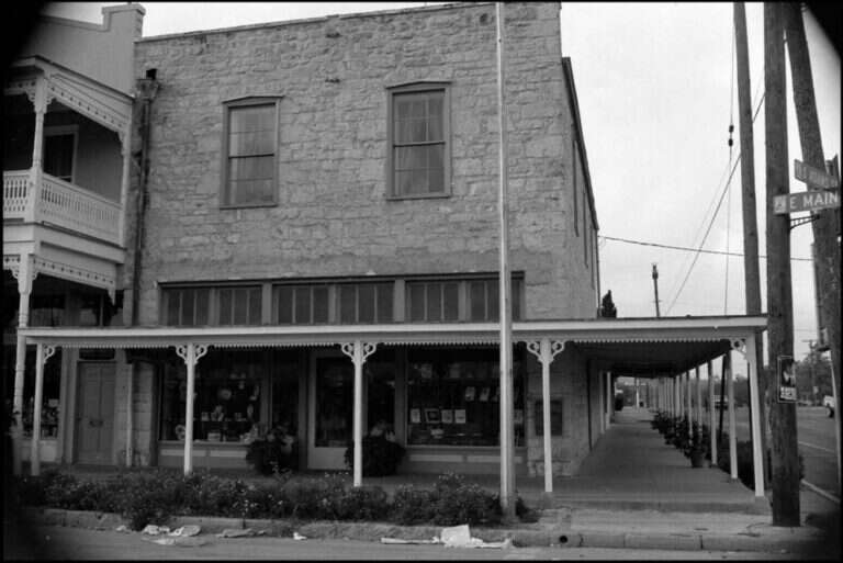 The two-story limestone Maier Building at 101 E. Main Street and Adams in Fredericksburg, Texas